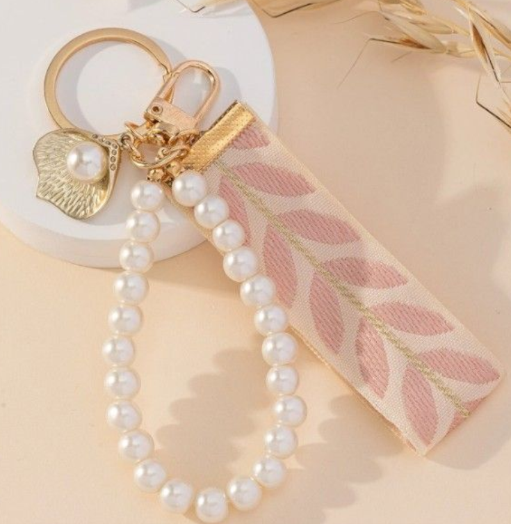 Leaf Pattern Ribbon With Pearl Charm Key Chain - Baby Pink